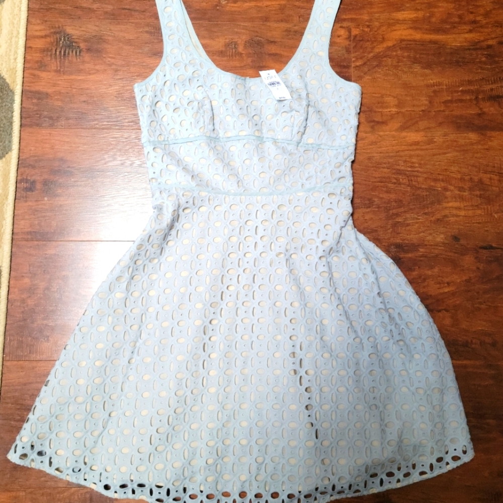 NWT, The Loft size 0 light blue dress with off white underlay.